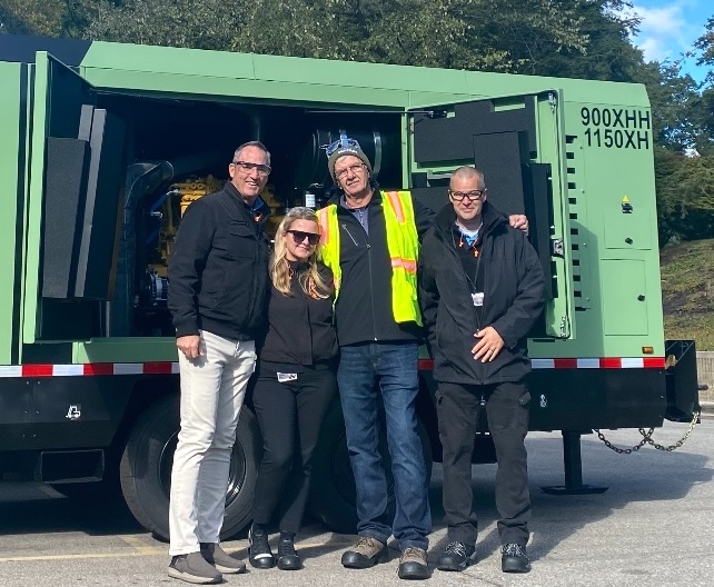 Equipment rental company team with Sullair compressor